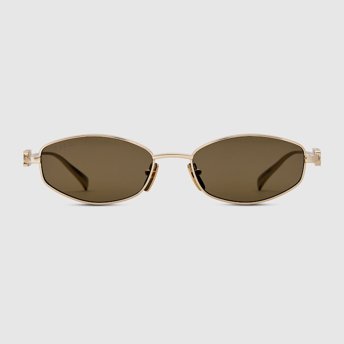 Oval frame sunglasses in gold-toned | GUCCI® US