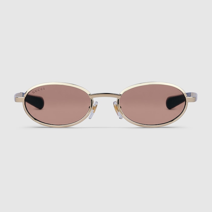 Oval frame sunglasses in gold-toned | GUCCI® US