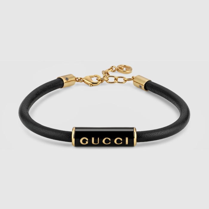 GUCCI ブラックレザーブレスレット Bracelet with enamel Gucci in black leather | GUCCI® US