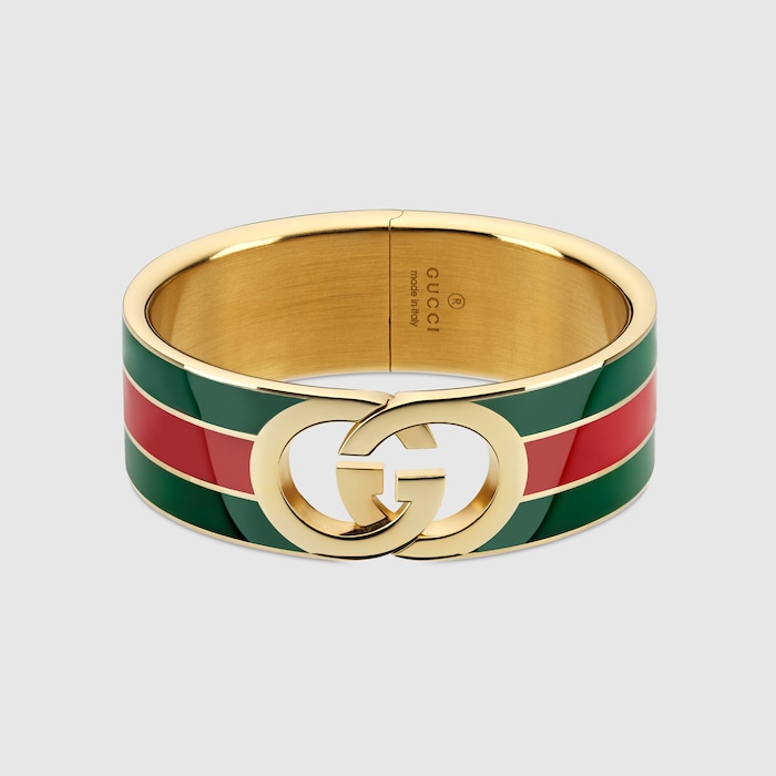 Gucci Interlocking bangle bracelet in gold-toned brass | GUCCI® US