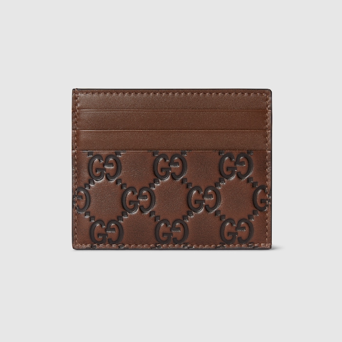 GG Emblem card case in brown and black GG leather | GUCCI® US