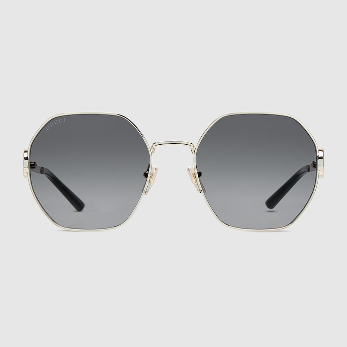 Oval frame sunglasses in gold | GUCCI® CA