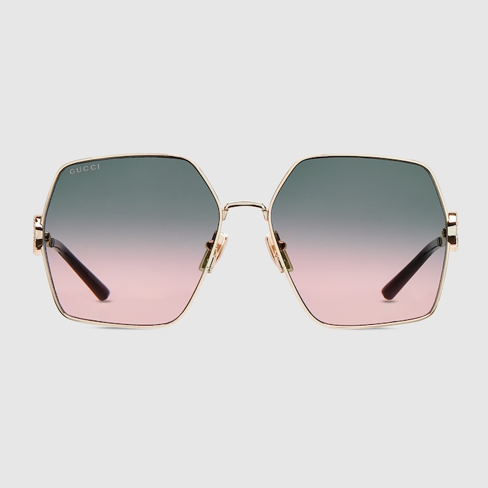Oval frame sunglasses in gold | GUCCI® US