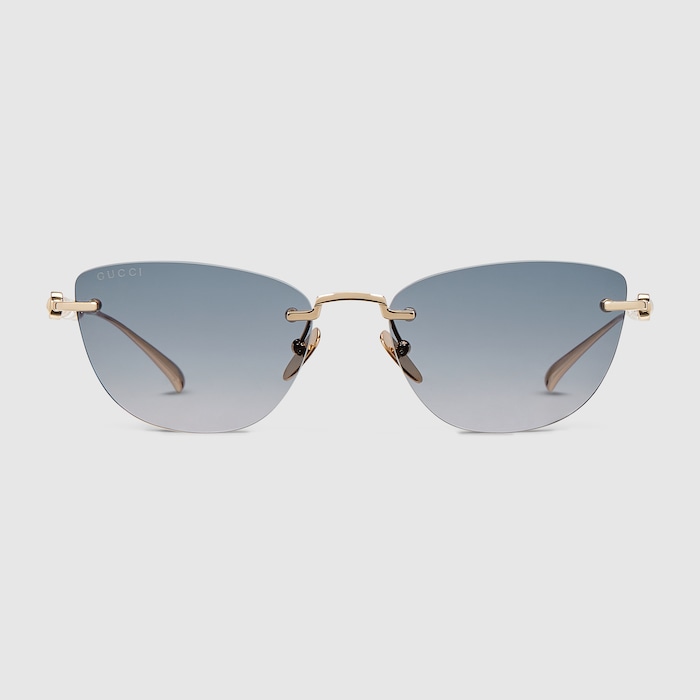 Cat-eye sunglasses in gold | GUCCI® CA
