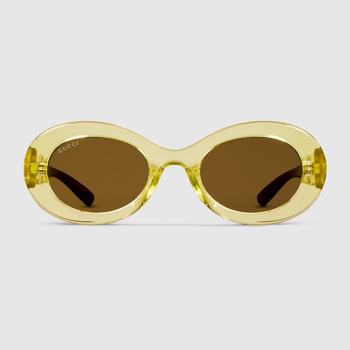 Oval frame sunglasses in transparent light green | GUCCI® CA