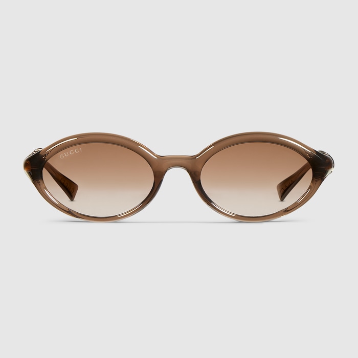 Oval frame sunglasses in transparent brown | GUCCI® US
