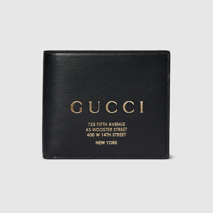 Bi-fold wallet with gold-foiled logo in black leather | GUCCI® US