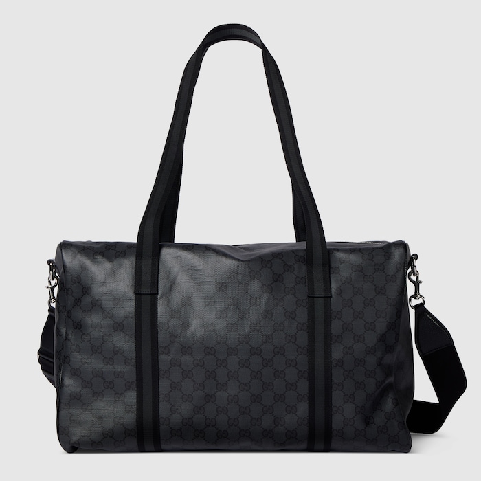 Medium duffle bag with Web in black GG canvas | GUCCI® UK