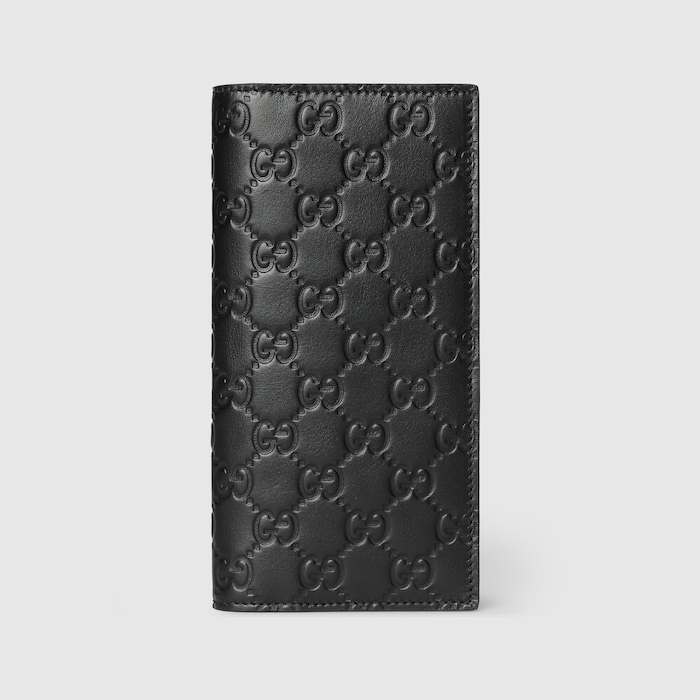 GG Emblem long wallet in black GG leather | GUCCI® SG