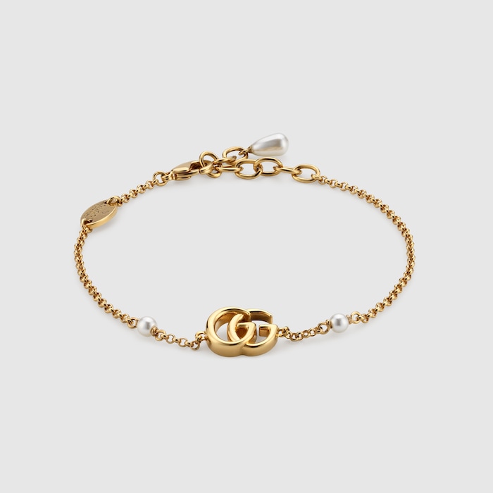 GG Marmont chain bracelet with charm in yellow gold-toned metal