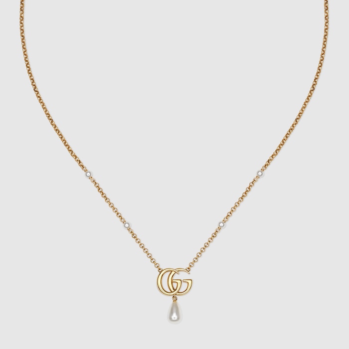 GG Marmont pendant necklace in yellow gold-toned metal | GUCCI® US