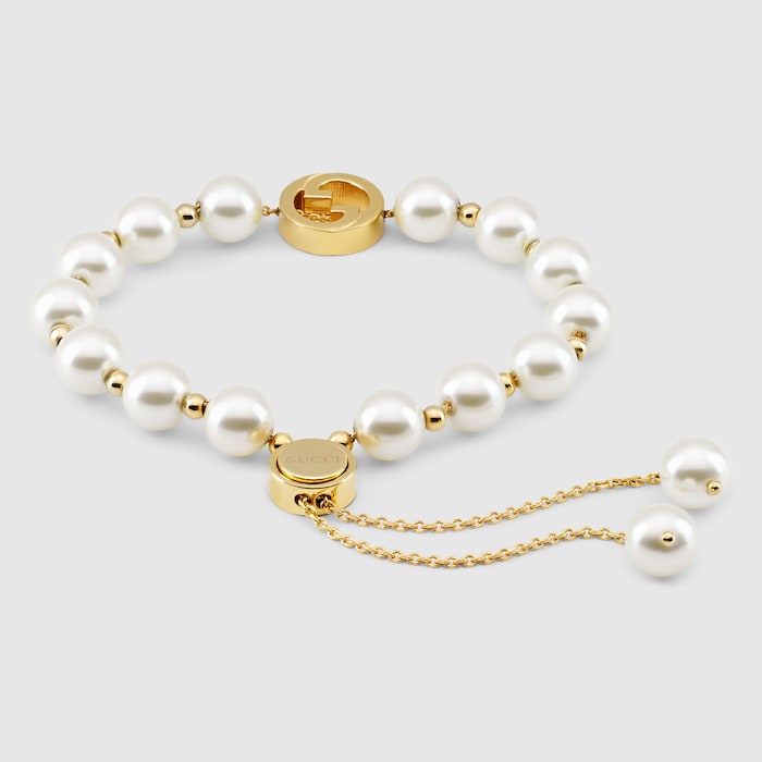 Gucci Interlocking pearl bracelet in light gold-toned brass