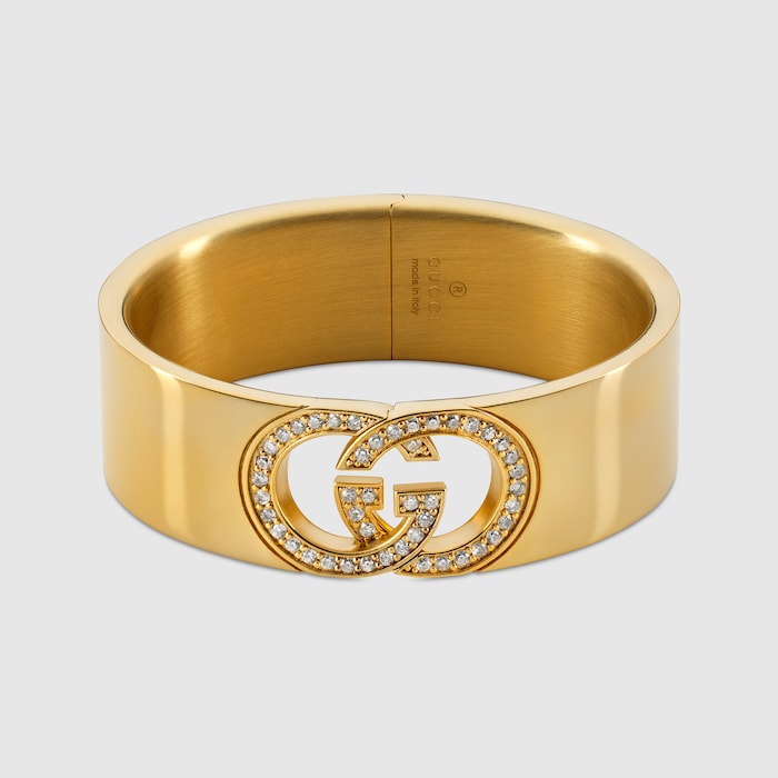 Gucci Interlocking crystal cuff bracelet in gold-toned brass