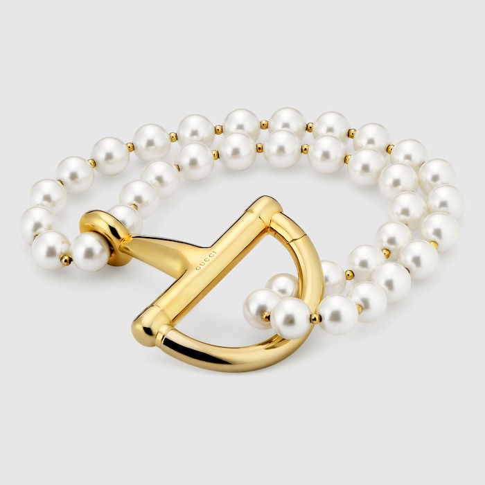 Bracelet with stirrup in gold-toned brass | GUCCI® US