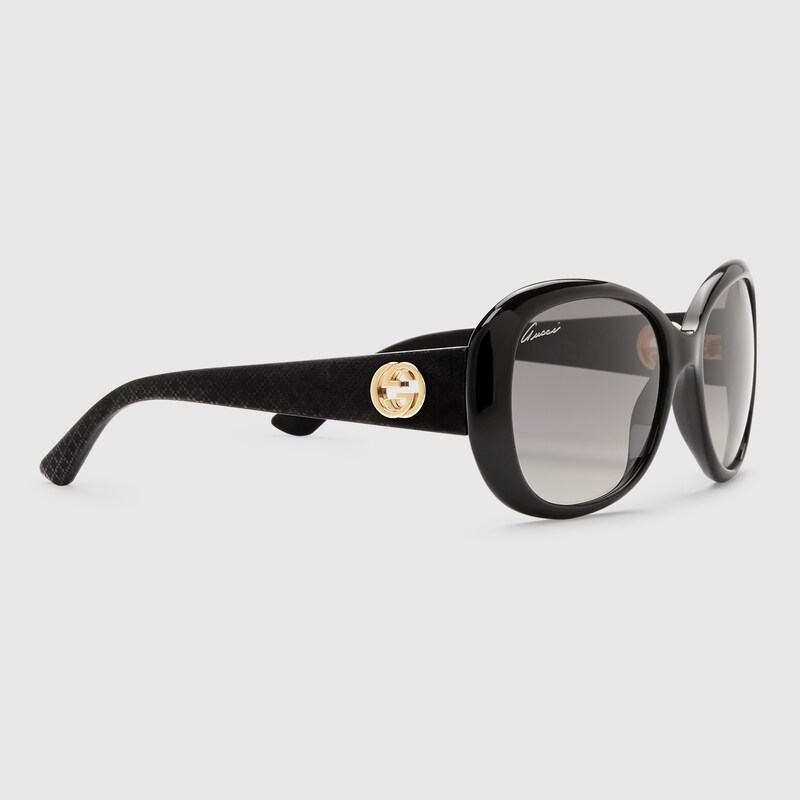 Occhiali da sole ovali in optyl e gomma in optyl nero | GUCCI® Italia