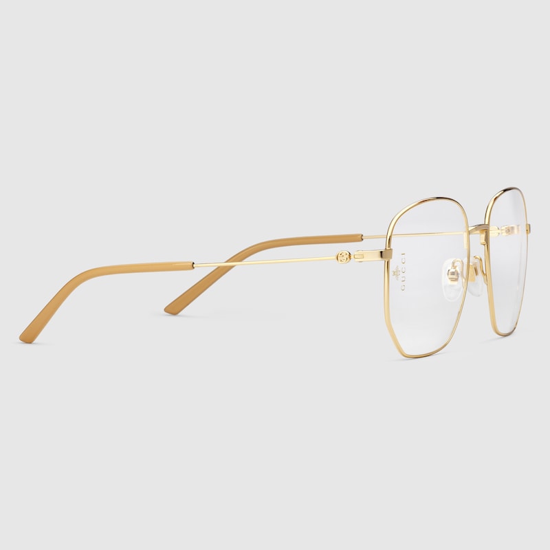 Occhiali rettangolari in metallo in color oro lucido | GUCCI® Italia