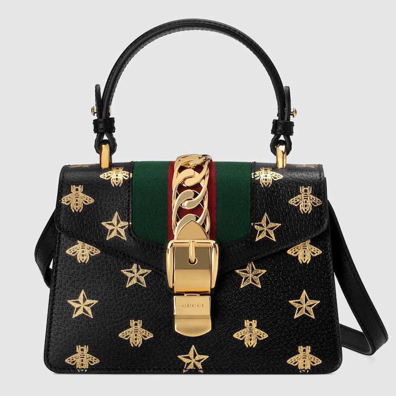 black gucci purse with bee