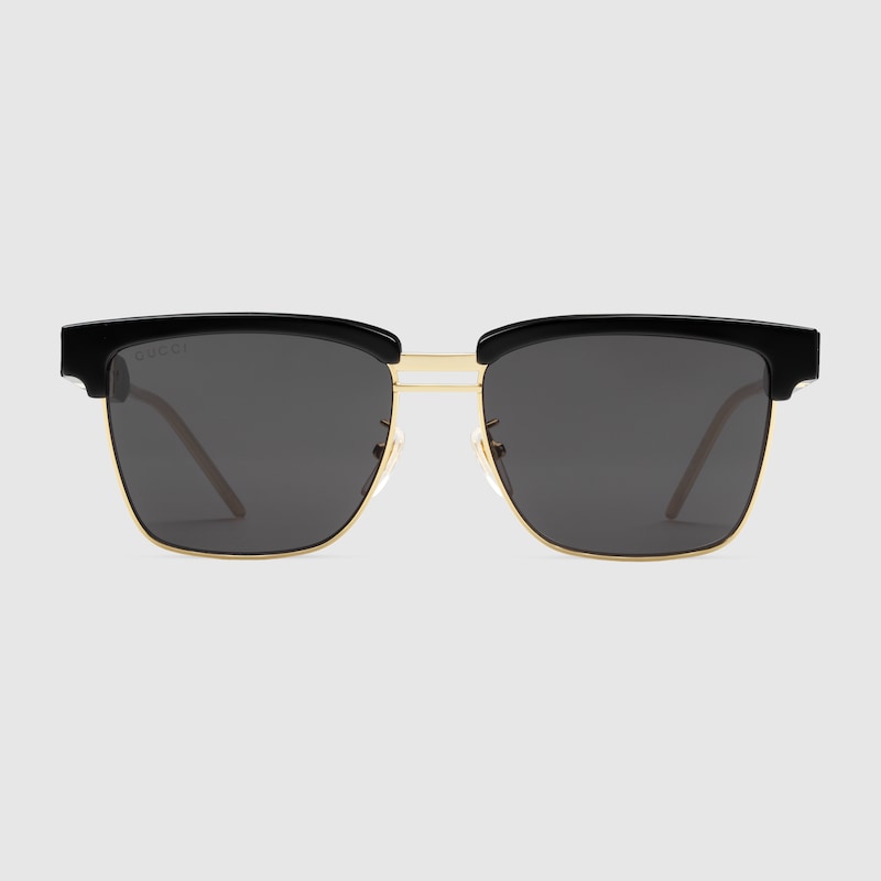 Occhiali da sole in acetato e metallo in nero | GUCCI® Italia