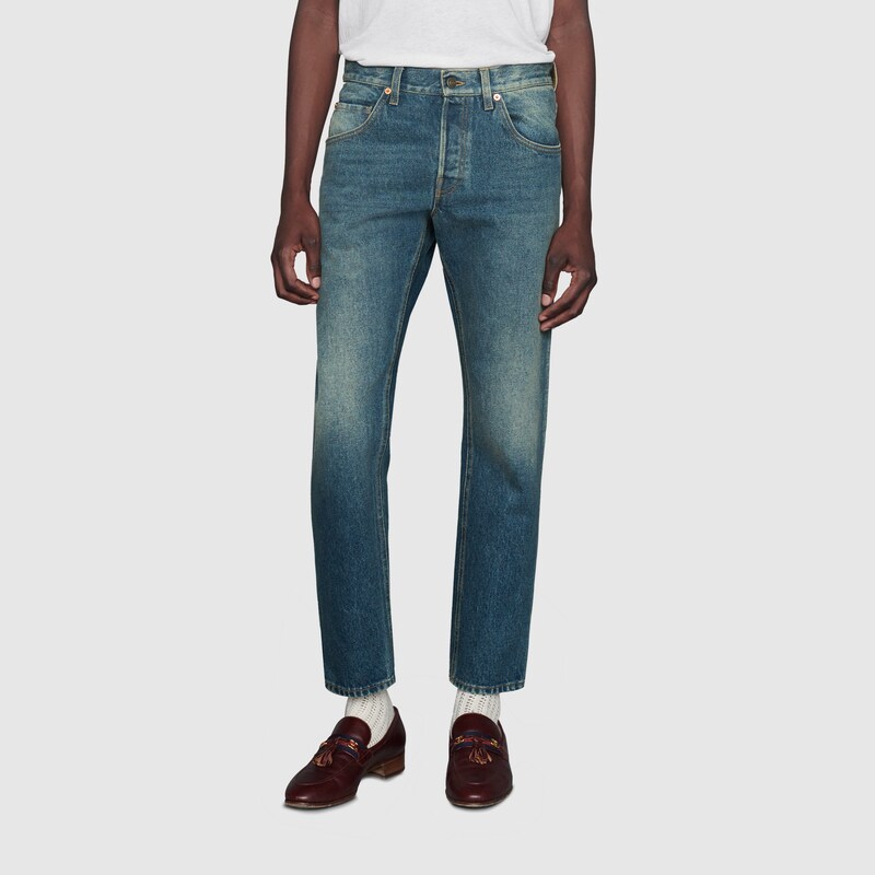 Jeans aderenti effetto délavé in denim blu | GUCCI® Italia