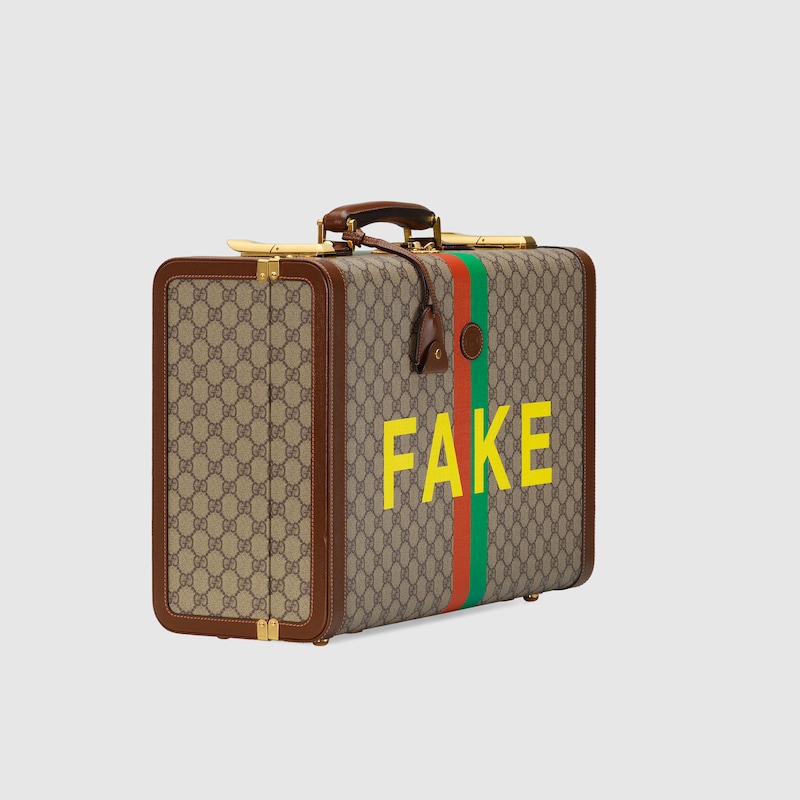 gucci luggage bag