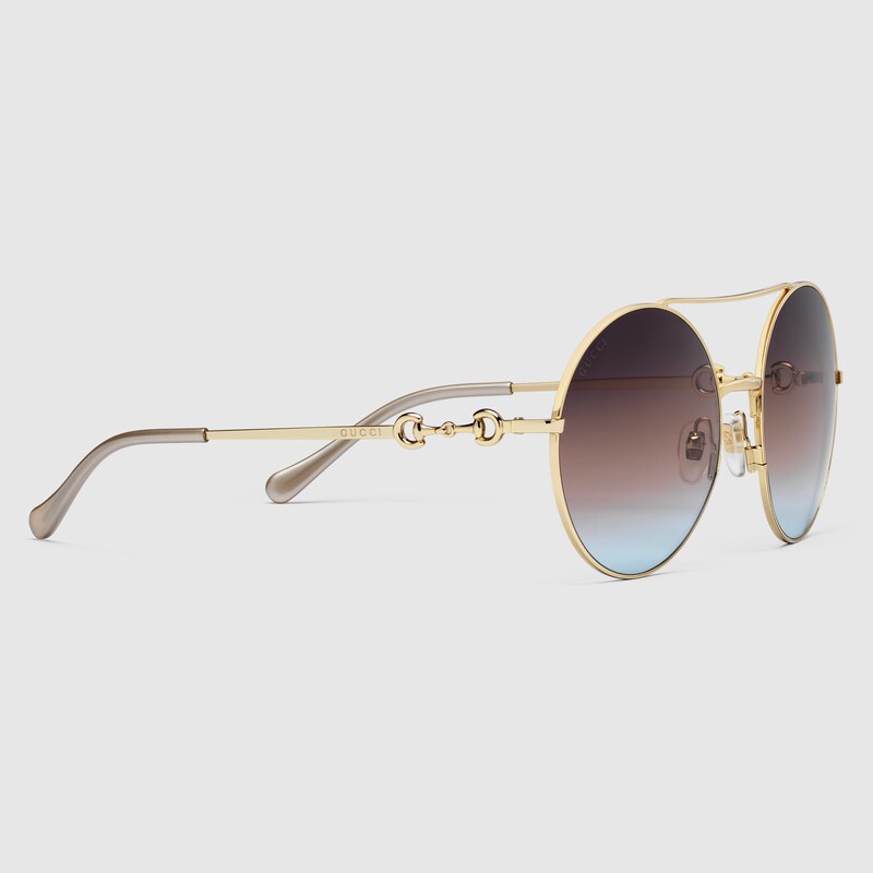 Occhiali da sole rotondi in metallo color oro e multicolore | GUCCI® Italia