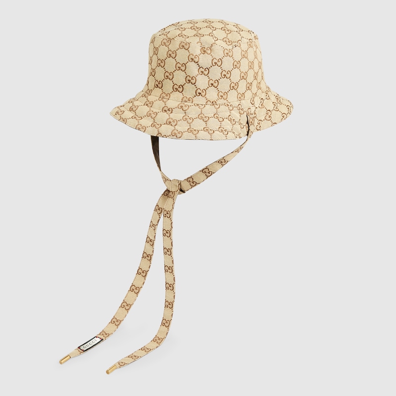 Cappello reversibile in tessuto GG e nylon in marrone | GUCCI® Italia