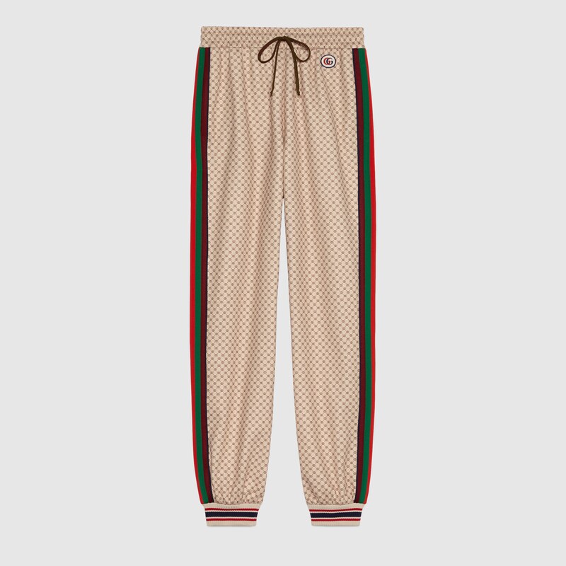 Pantalone in jersey con stampa con logo GG in beige | GUCCI® Italia