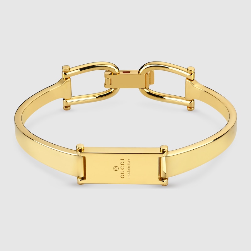 Gucci Stirrup Motif Bangle Bracelet In Gold