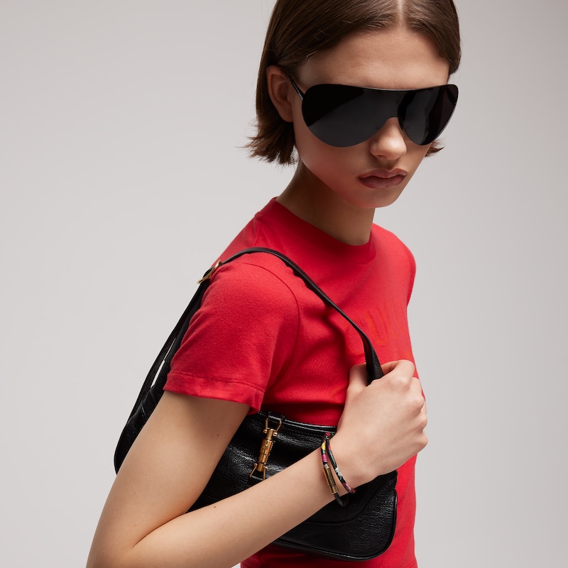 Gucci Leather Double Bracelet With Gucci Script | Thumbnail 2 Gucci Leather Double Bracelet With Gucci Script | Thumbnail 2