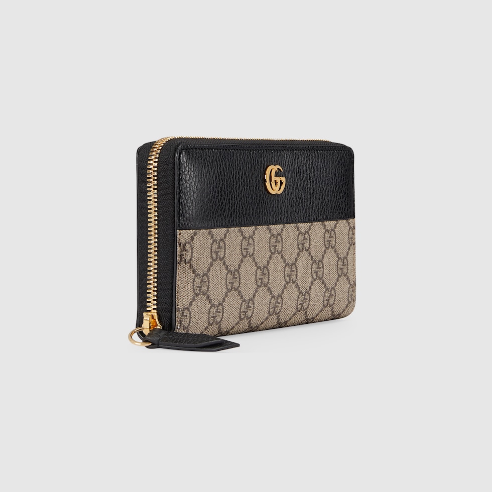 GG Marmont bi color zip around wallet in black leather and GG Supreme GUCCI US