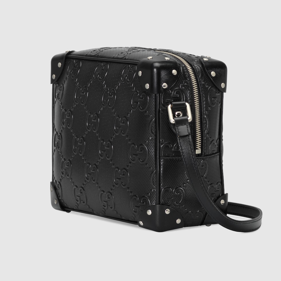 Black GG embossed shoulder bag | GUCCI® UK