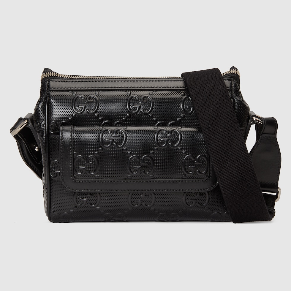 GG embossed messenger bag in black leather GUCCI® TH
