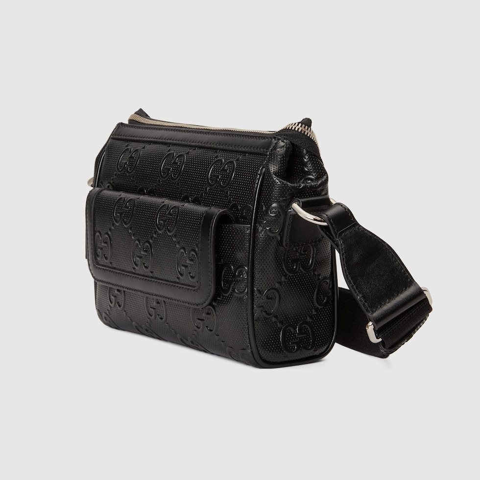 GG embossed messenger bag in black leather GUCCI® TH