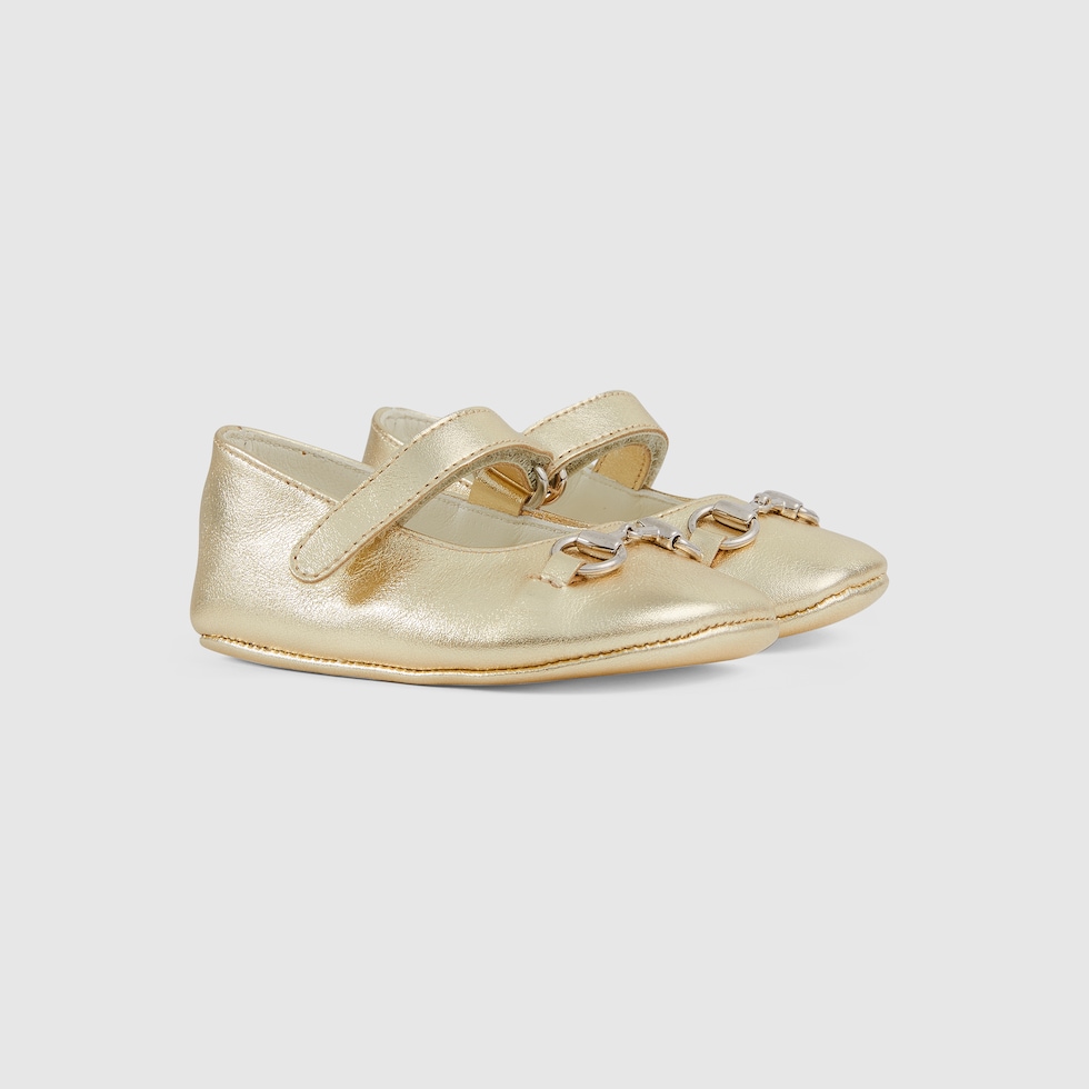 Gold baby shoes sales