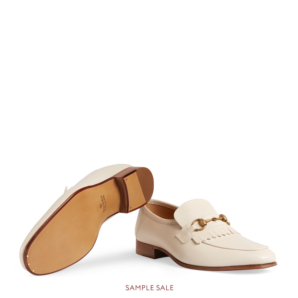 Men s loafer with Horsebit and fringe in ivory leather GUCCI Australia