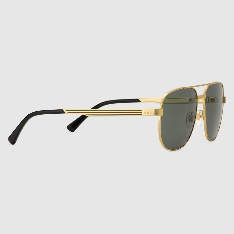 Gafas de sol con marco de navegador inmetal de tono oro GUCCI MX