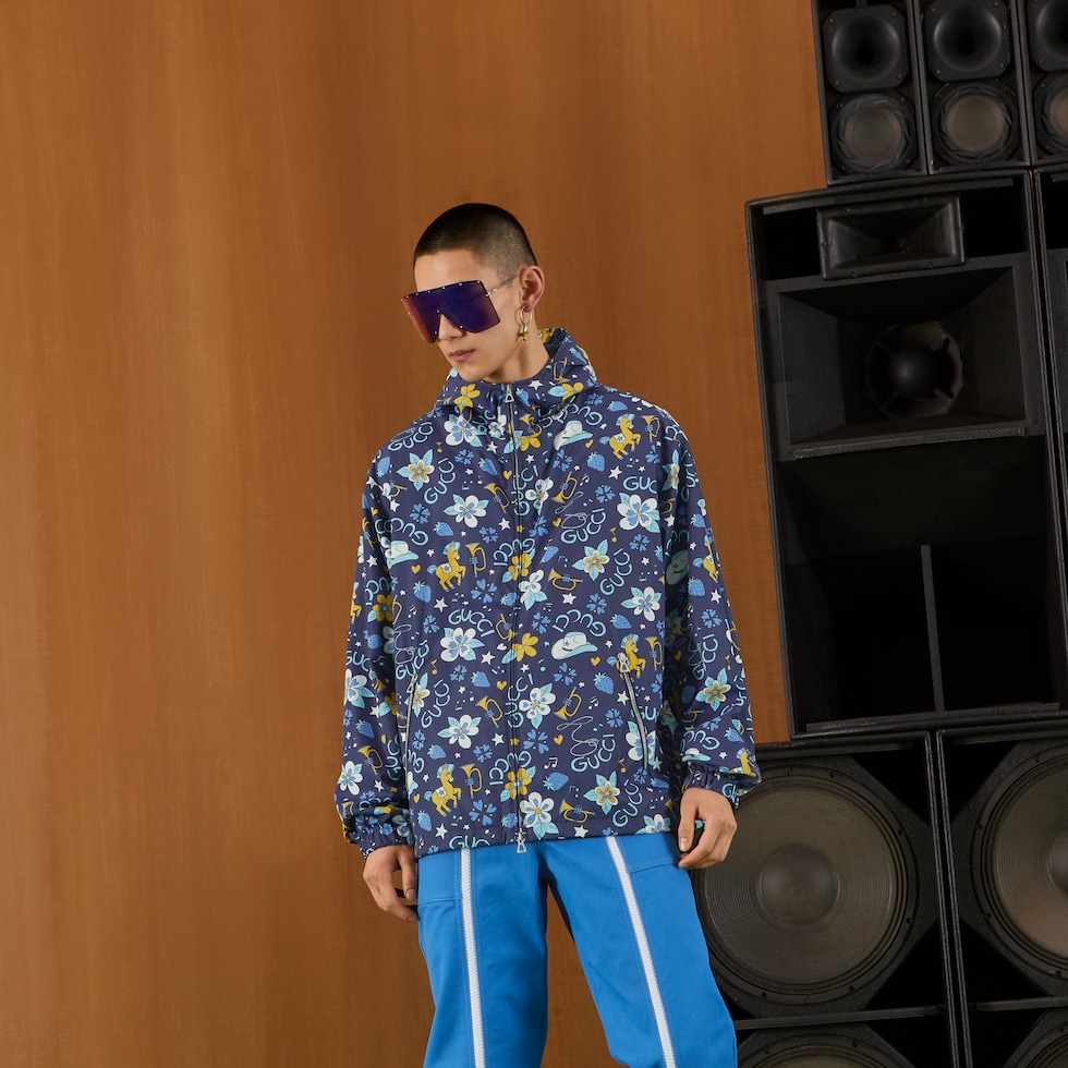 Nylon jacket with flower and pony print in blue | GUCCI® MX