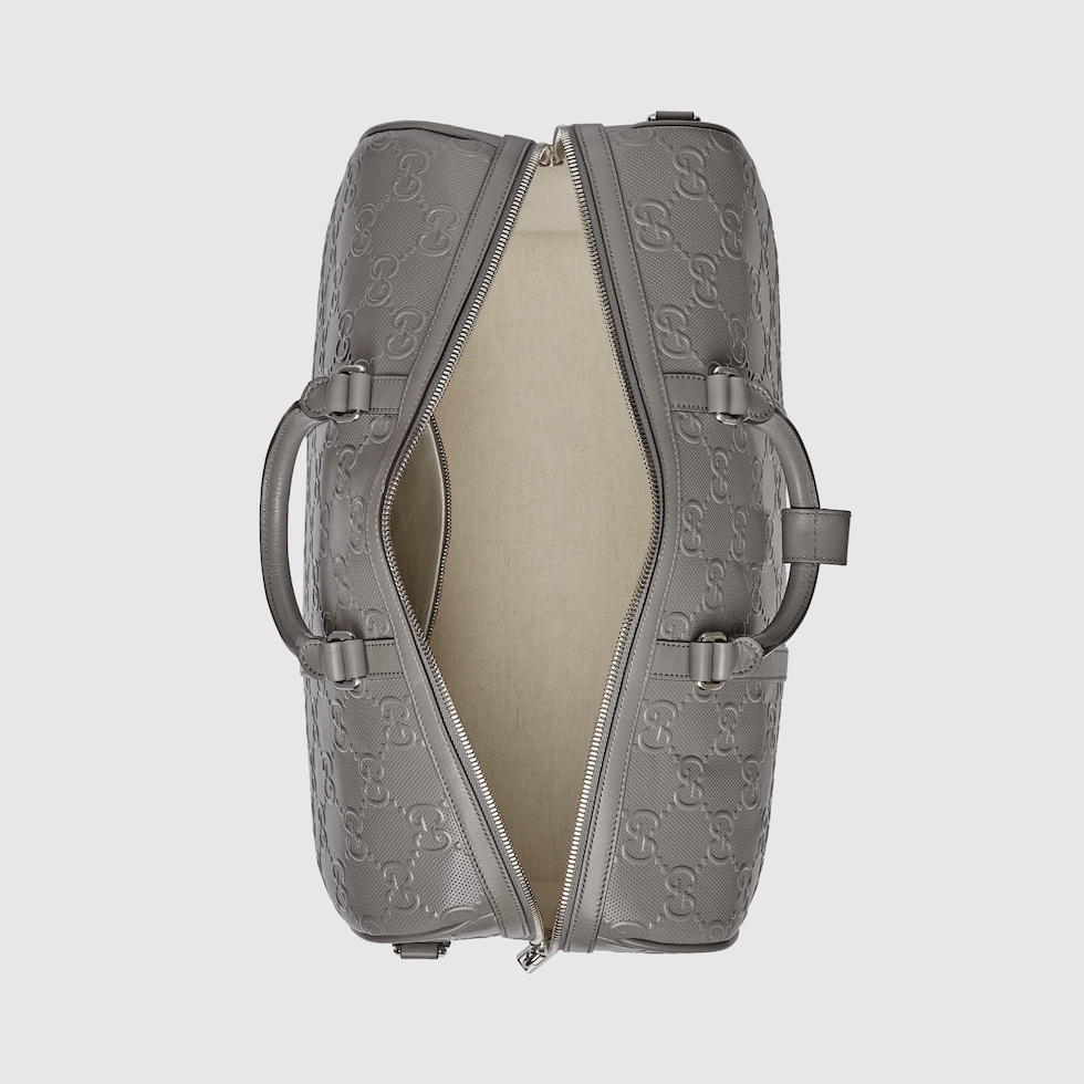 GG embossed duffle bag in grey leather | GUCCI® SG
