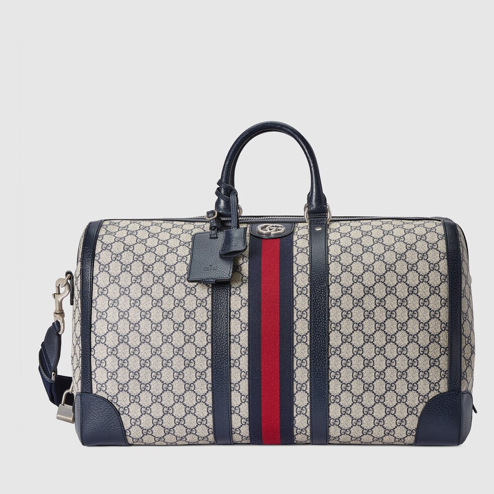Große Gucci Savoy Reisetasche in beiger und blauer GG Supreme | GUCCI® CH