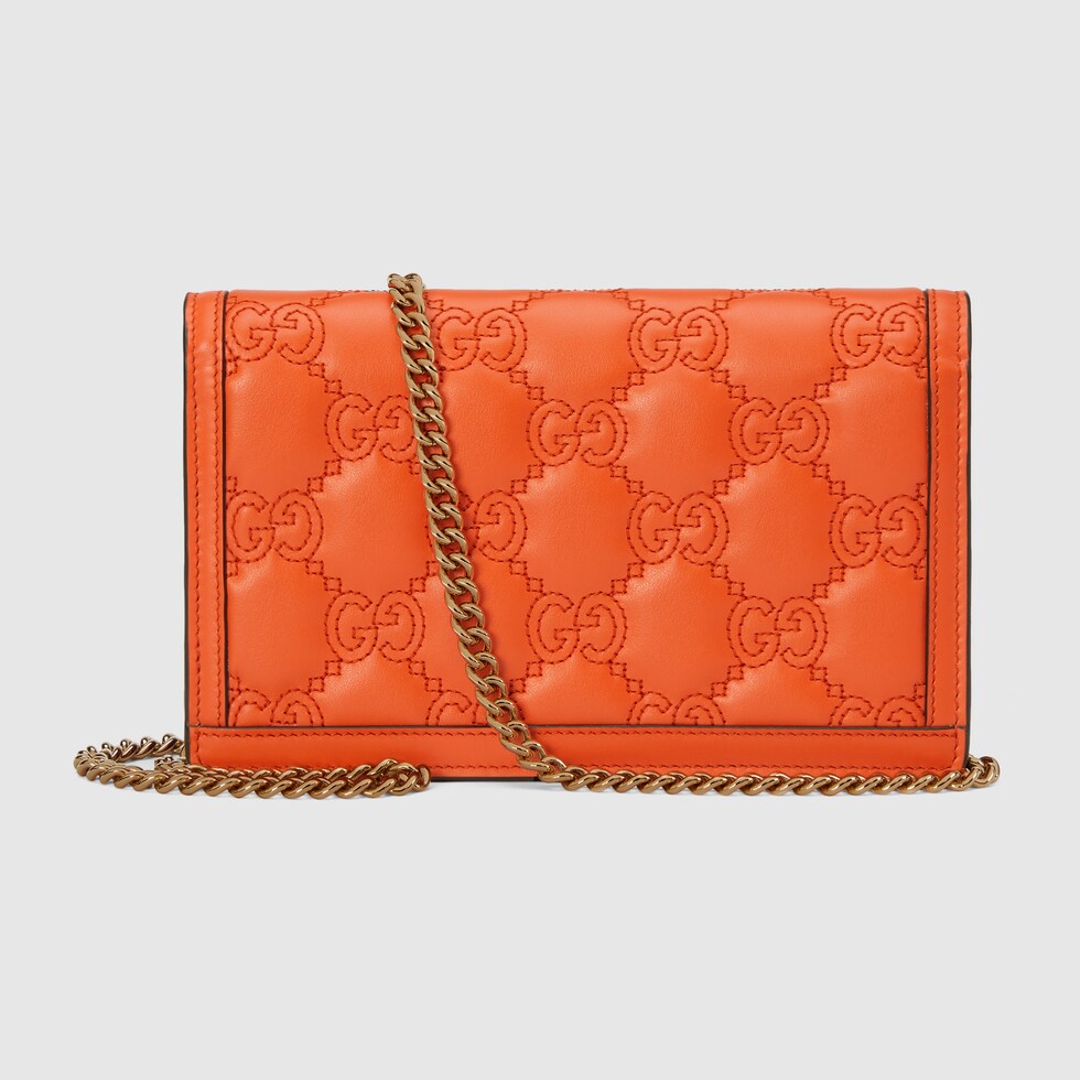 GG Matelassé chain wallet in orange leather | GUCCI® SG