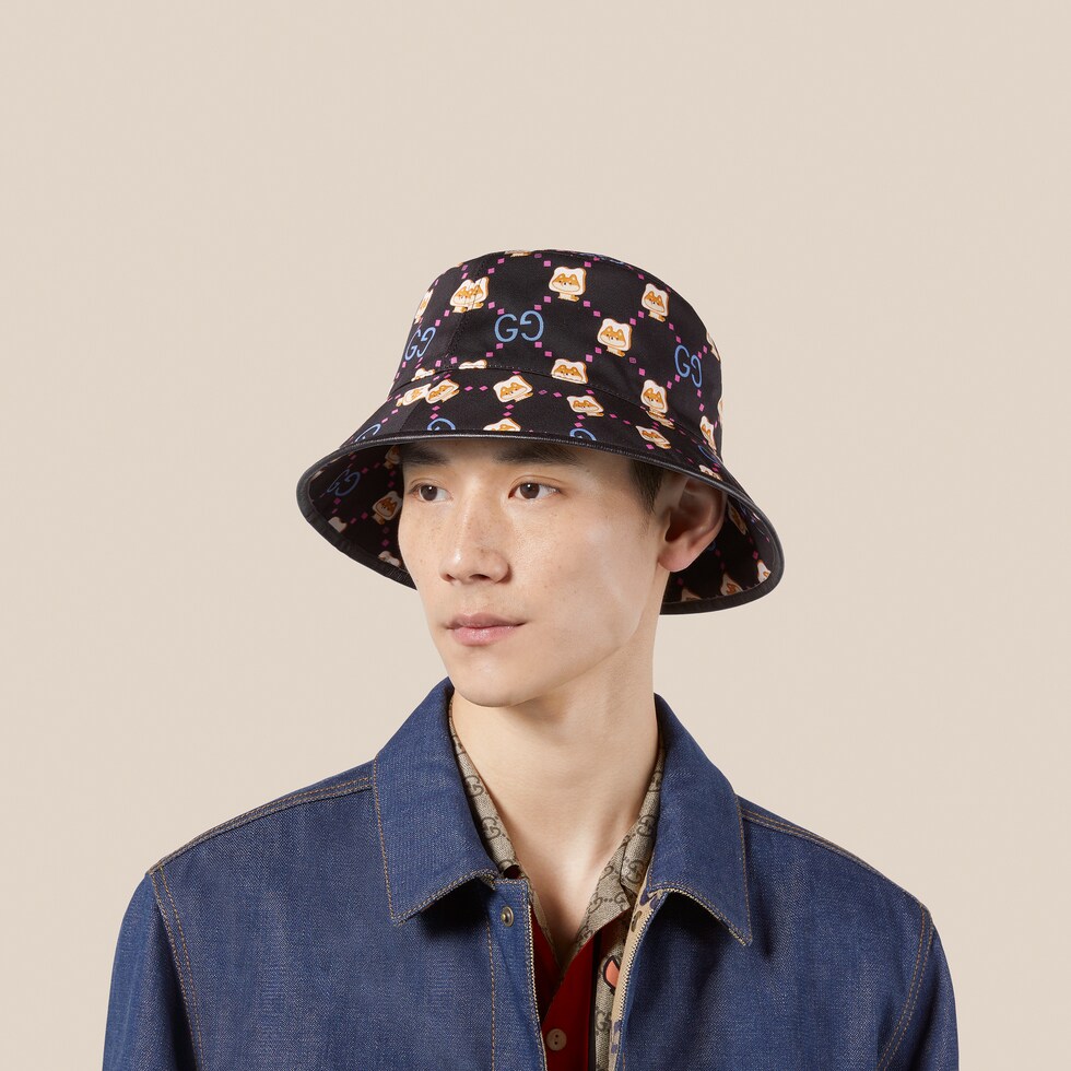 Cotton bucket hat with GG animal print in black GUCCI® ZA
