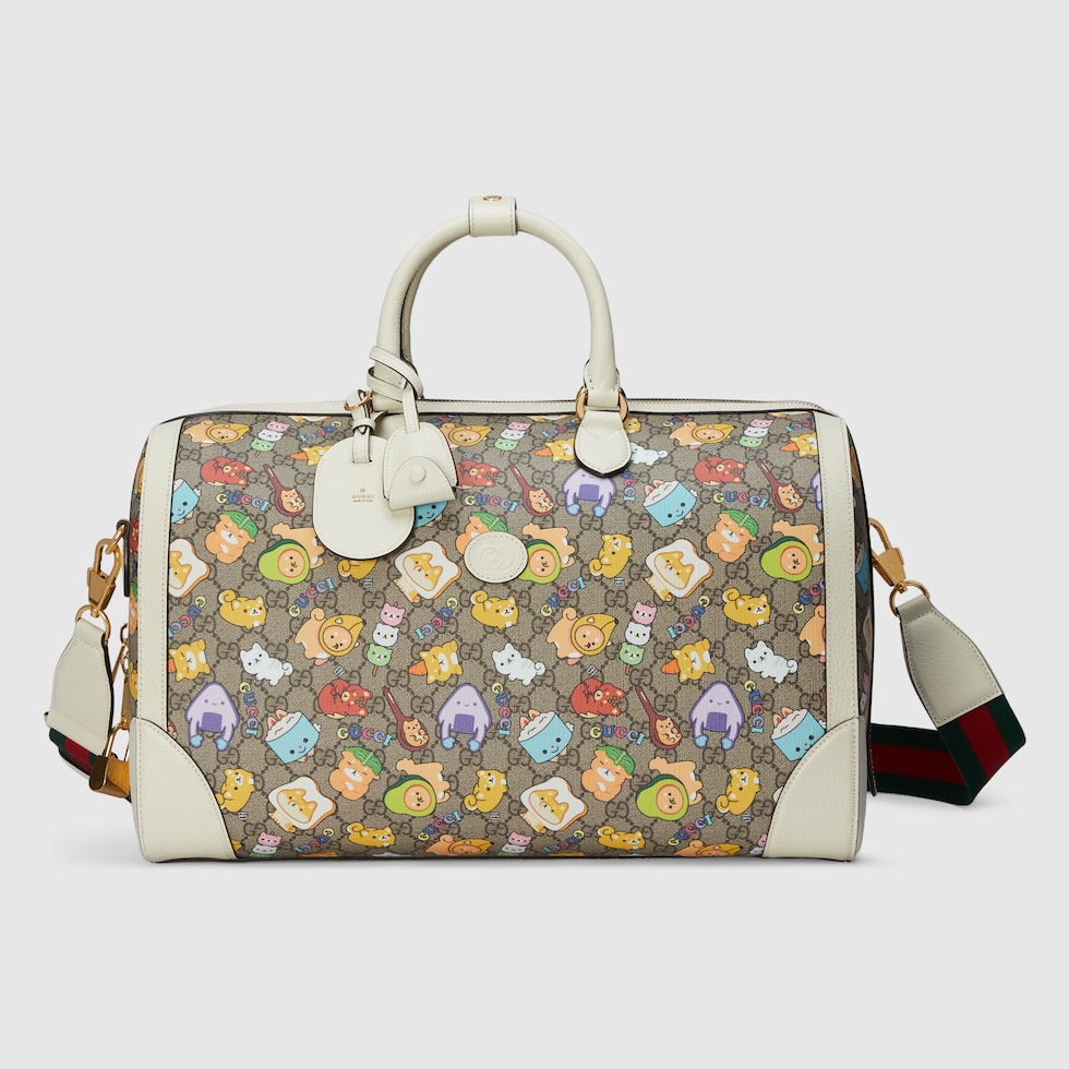 Gucci animal print duffle bag in beige and ebony Supreme GUCCI® US