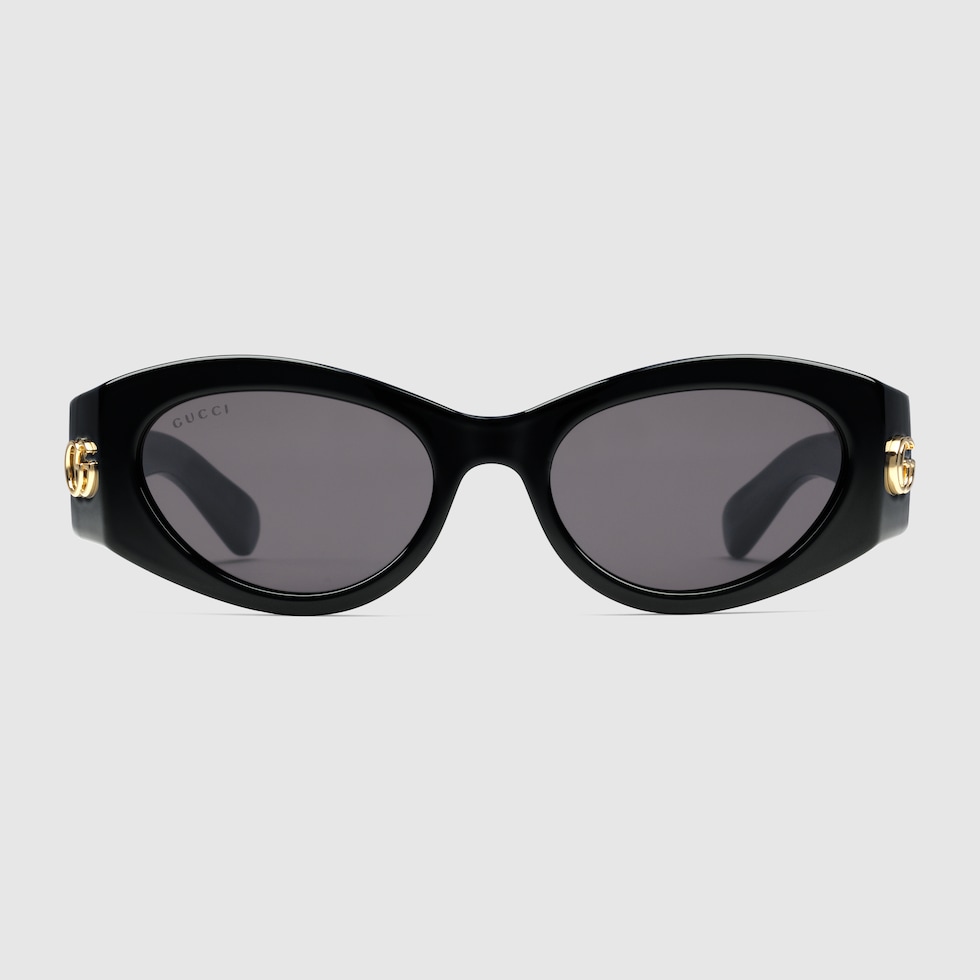 Gucci Eyewear logo plaque cat eye sunglasses women Acetate One Size Black