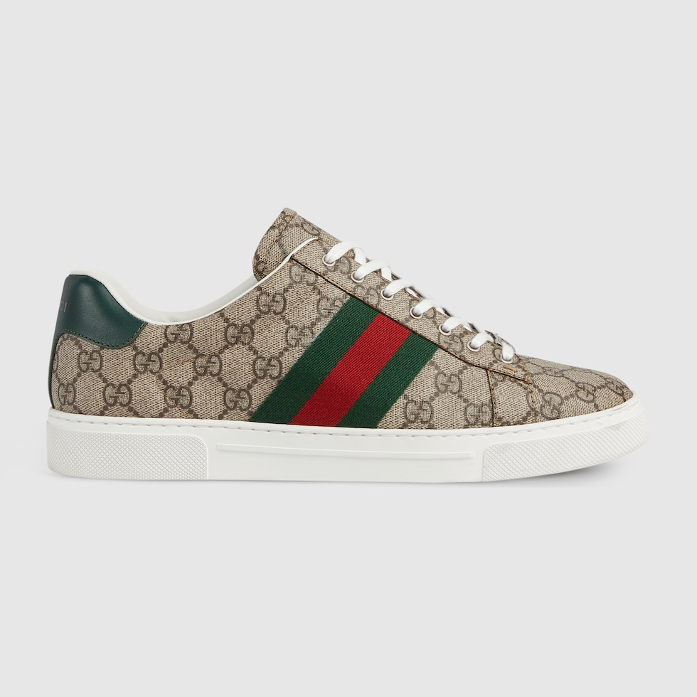 Sneaker Gucci Ace uomo con dettaglio Web in tessuto GG Supreme beige ed ebano GUCCI Italia
