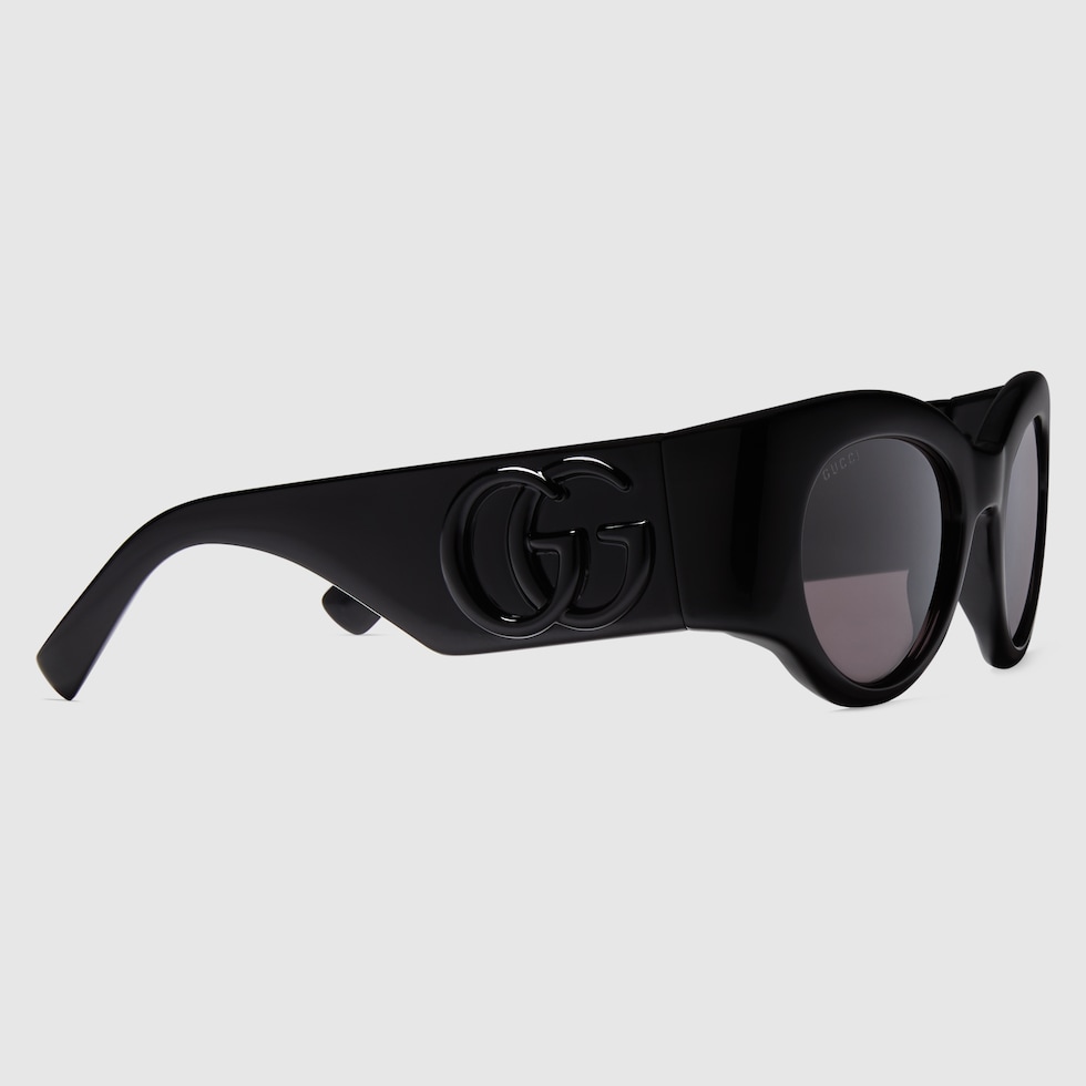 GUCCI ブラック GG Oval サングラス Oval frame sunglasses in black | GUCCI® US