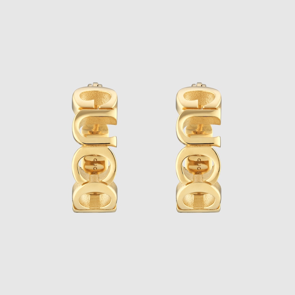 GUCCI ロゴデザイン 片耳用ピアス GUCCI” ロゴ フープピアス ・イエローゴールドトーン | GUCCI公式