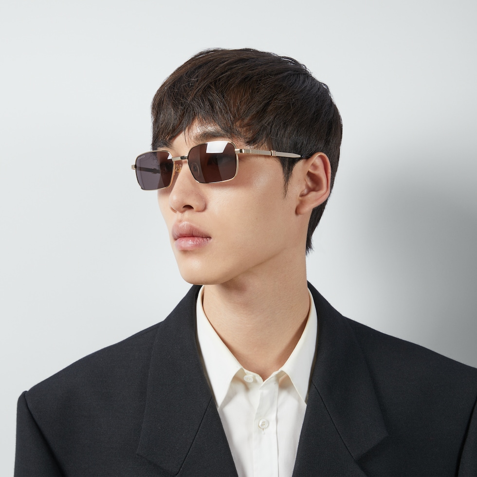 Rectangular-frame sunglasses in yellow gold-toned metal | GUCCI® US