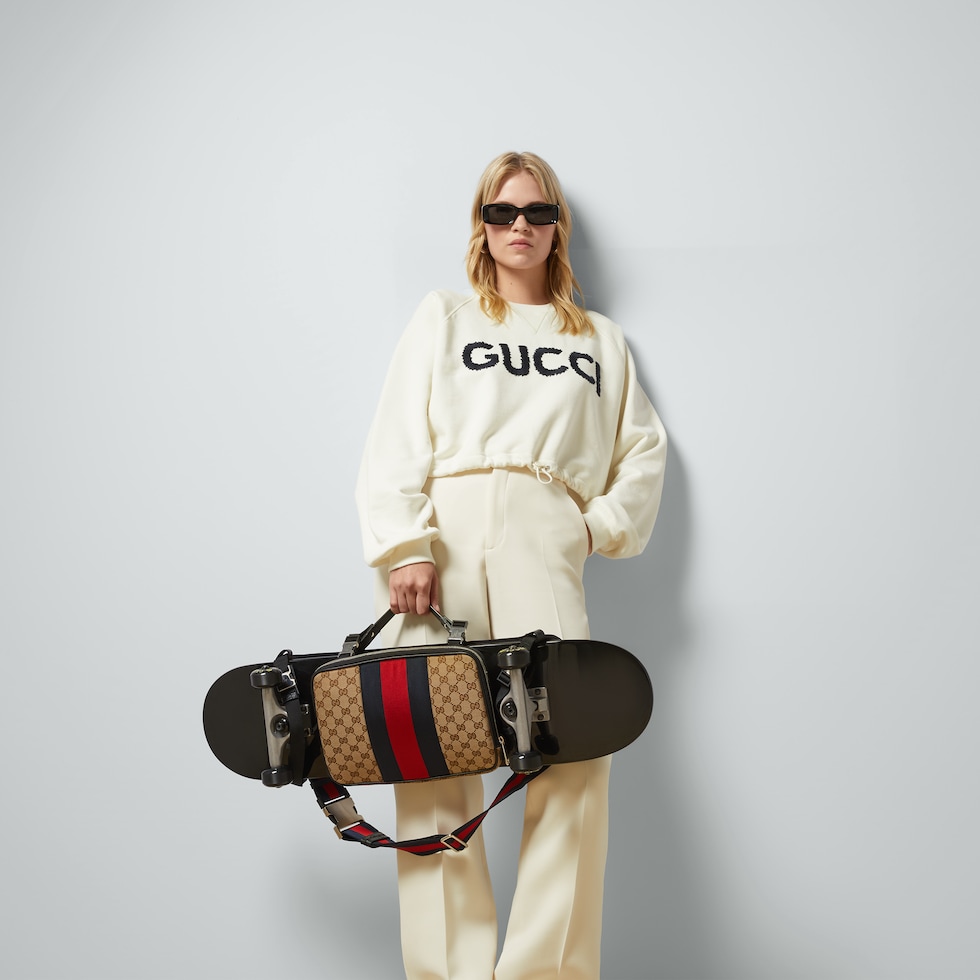 Gucci logo skateboard in black wood | GUCCI® LU