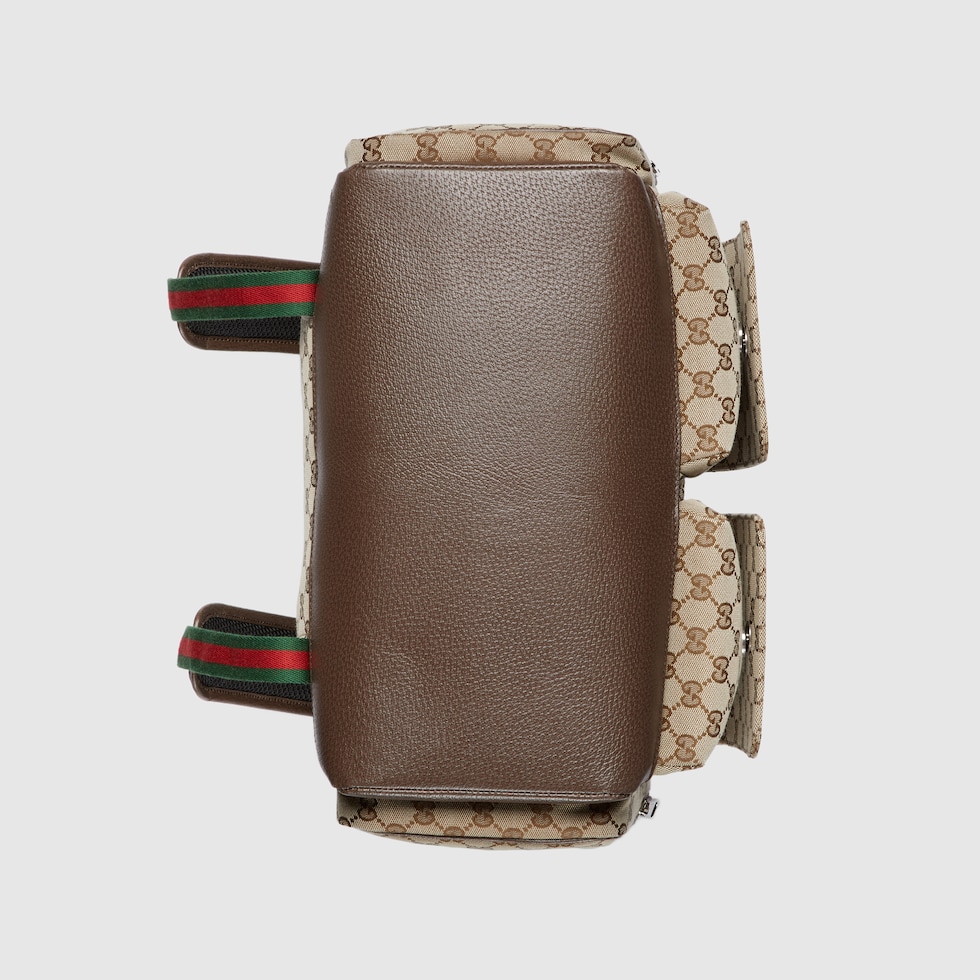 Gucci diaper bag girl online