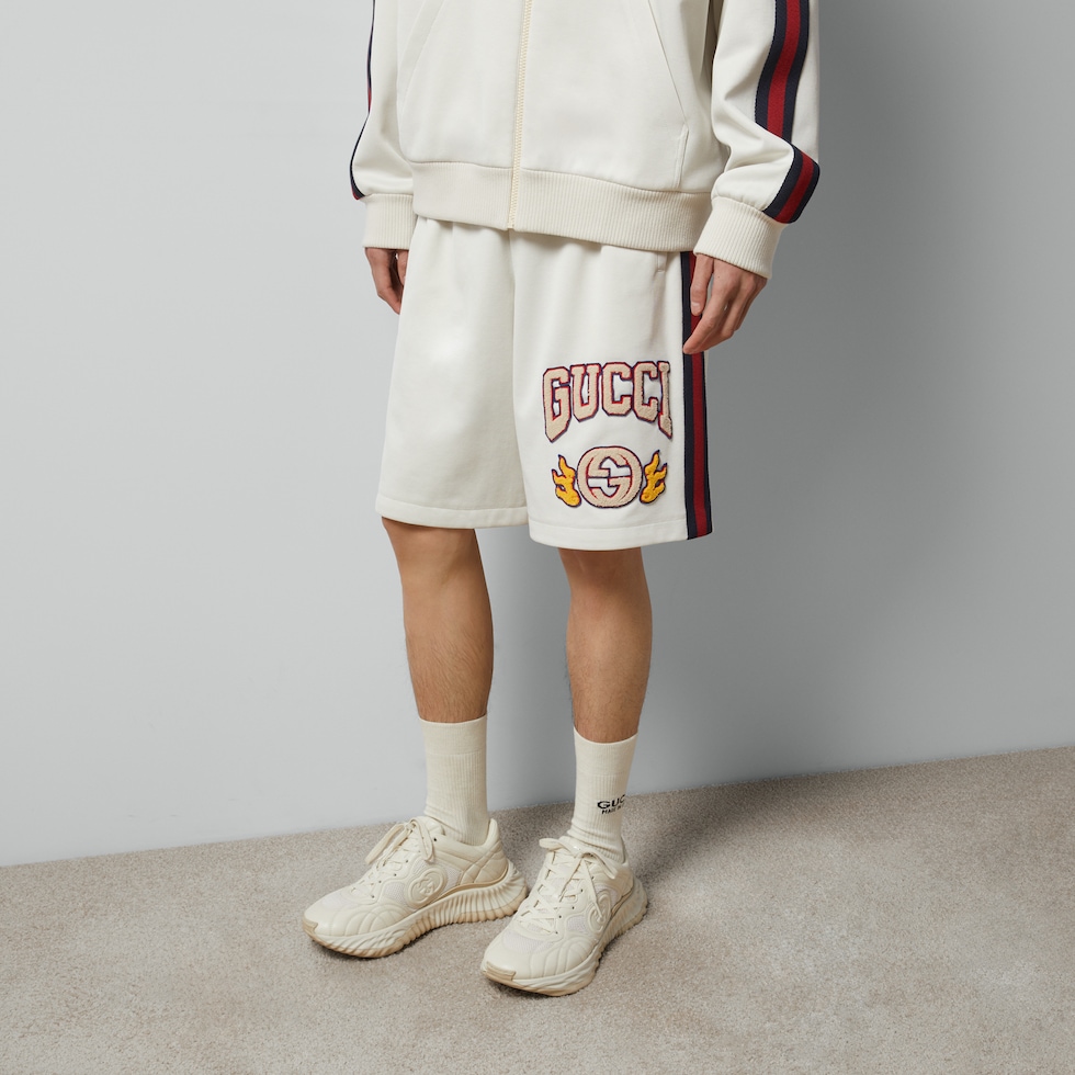 Technical jersey shorts in off white GUCCI
